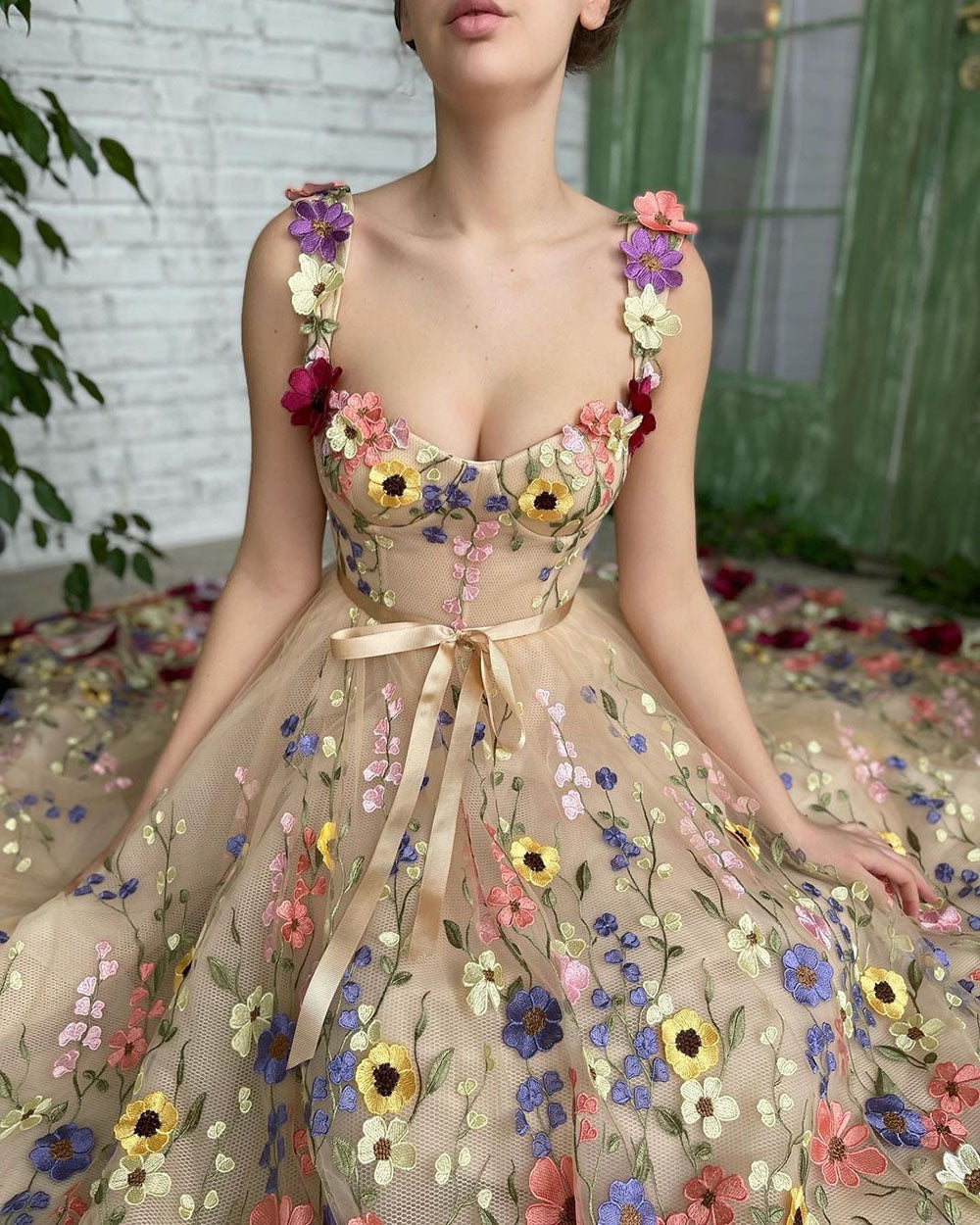 Woman wearing a floral dress with a blurred background