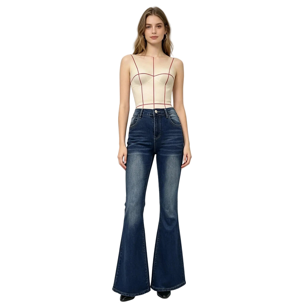 Woman wearing a beige bodysuit and blue flared jeans on a white background