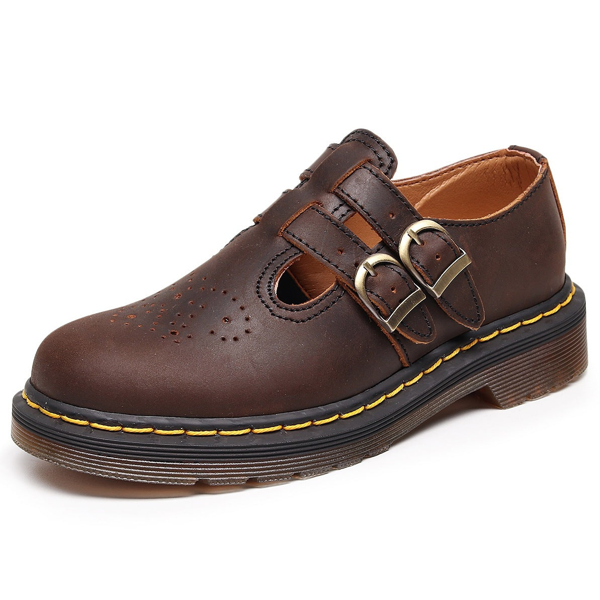 Brown leather shoe with a gold buckle on a white background
