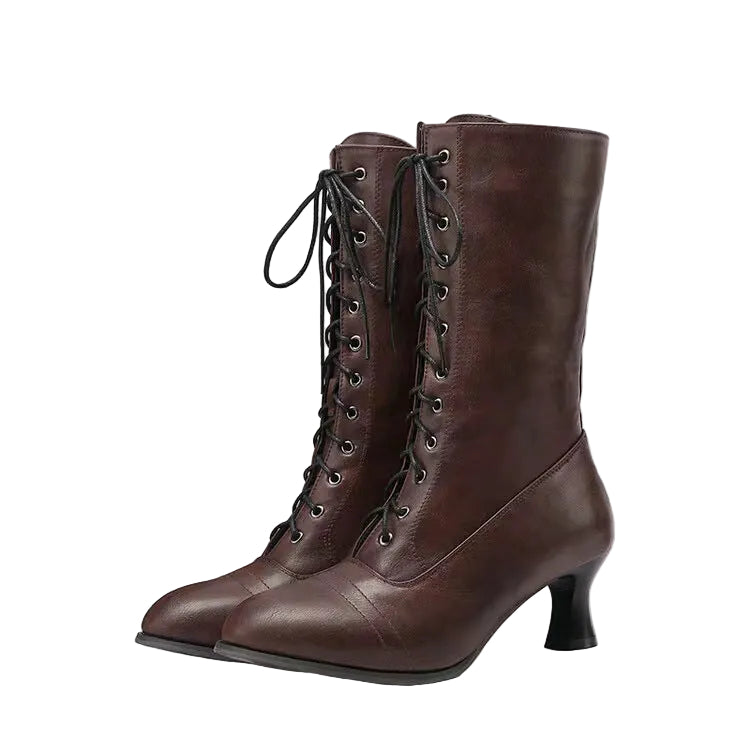 Pair of brown lace-up boots on a white background