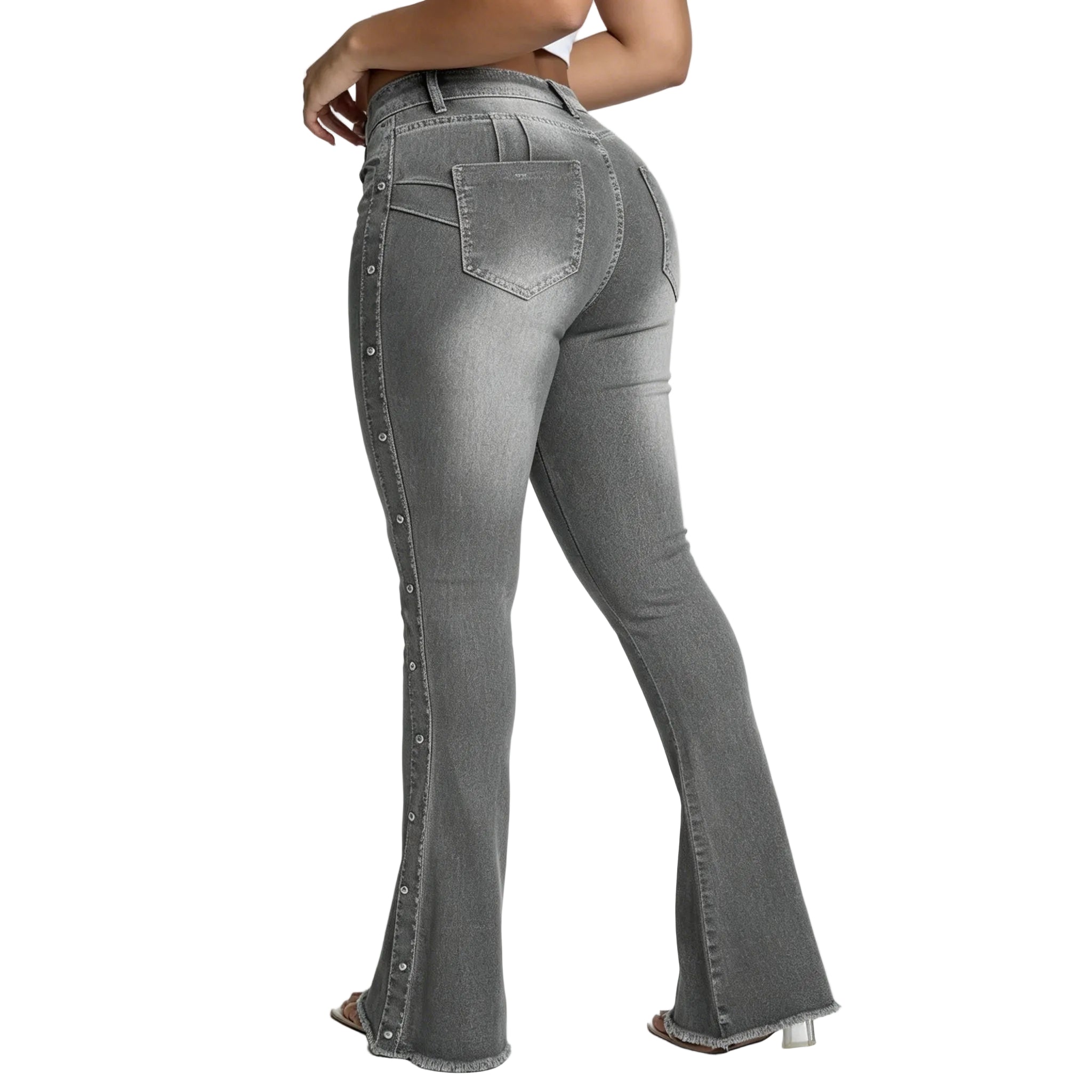 Gray flared jeans worn by a person on a white background