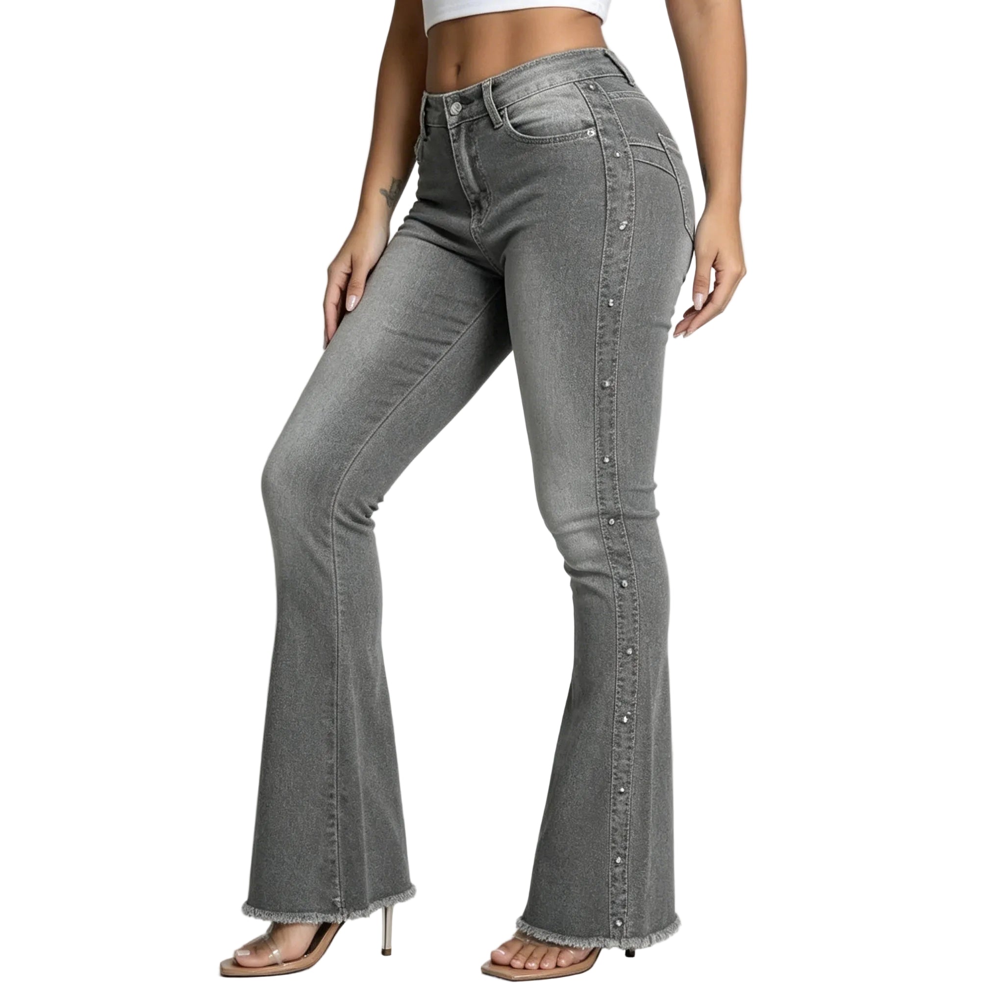 Gray flared jeans worn by a person on a white background