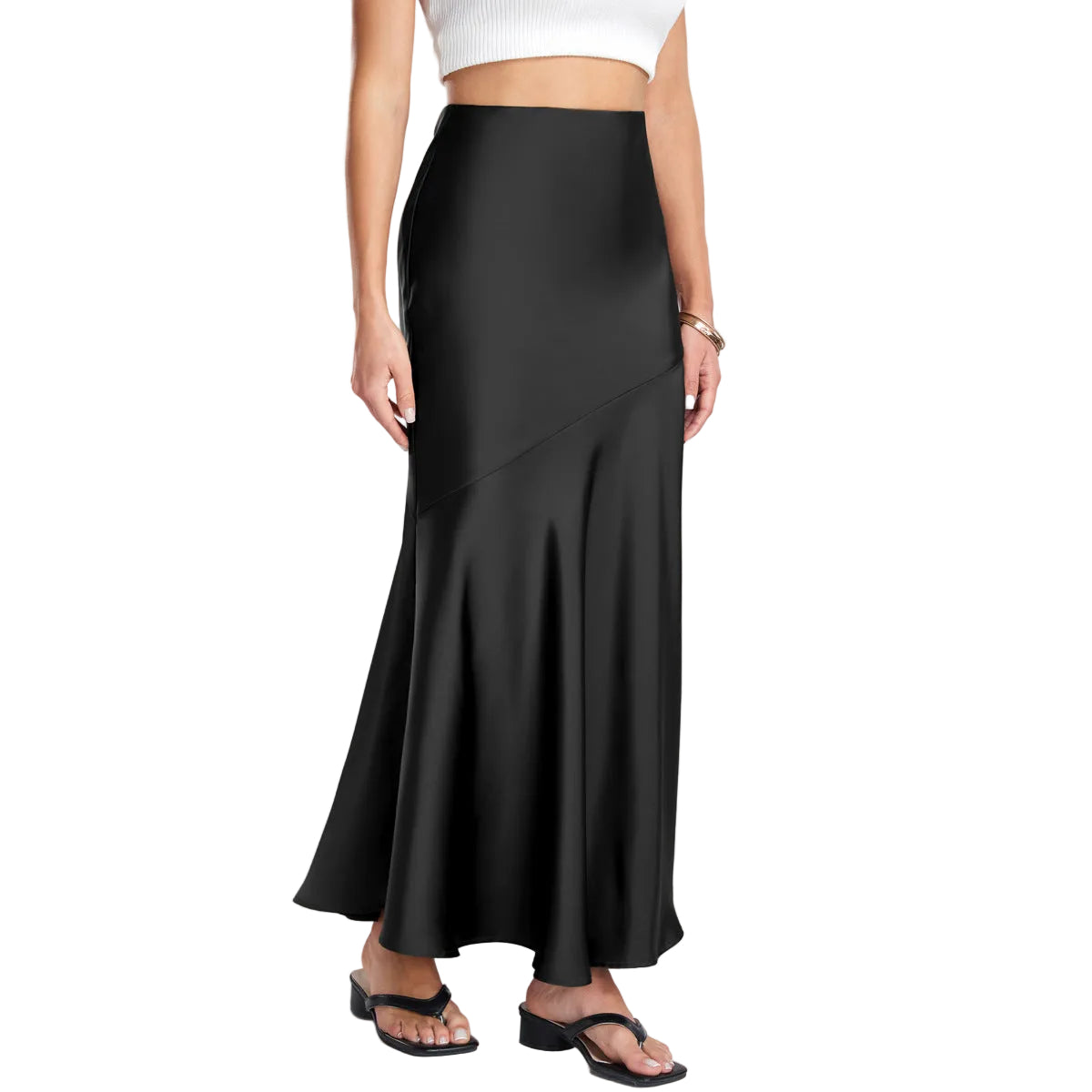 Person wearing a black skirt on a plain background