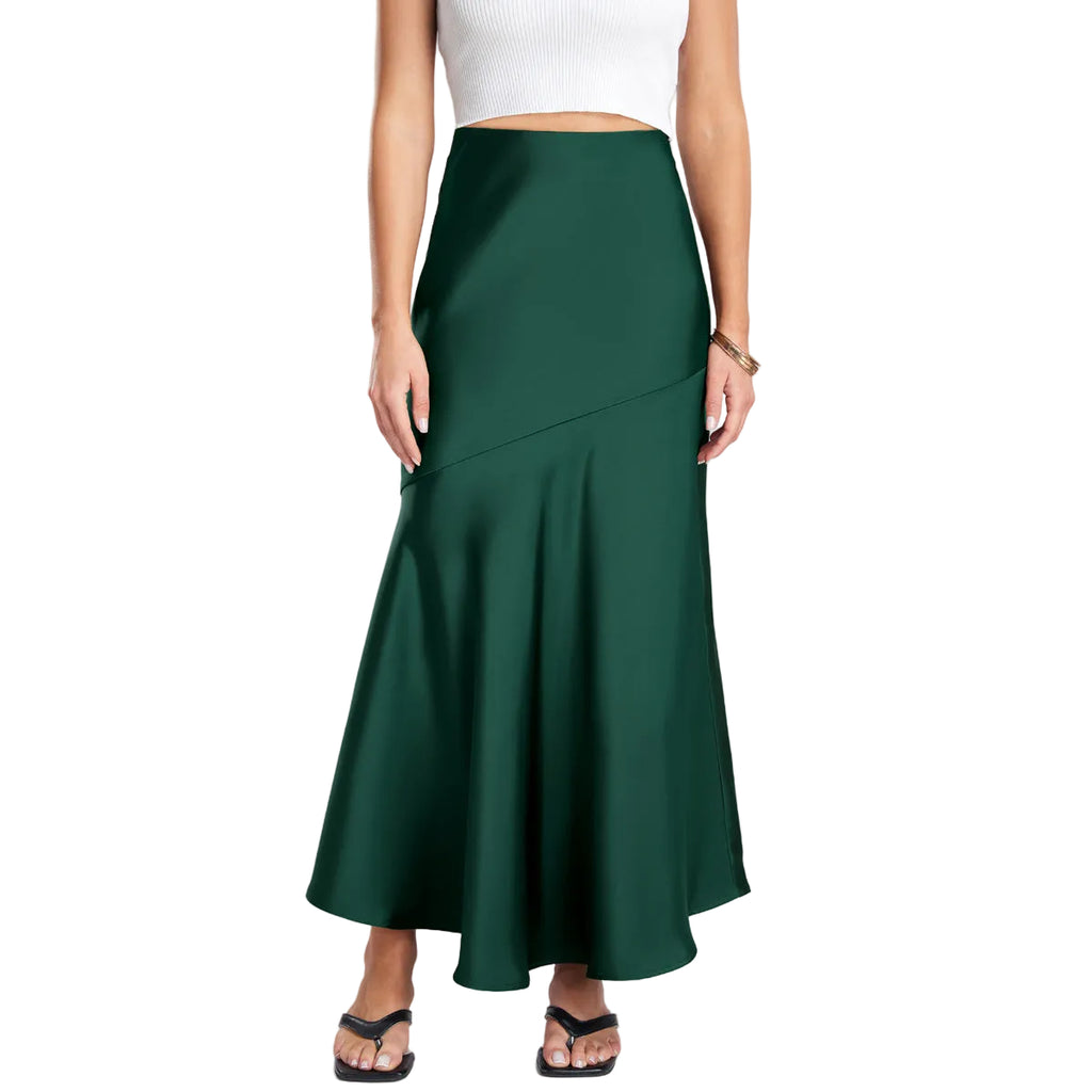 Green skirt worn by a person on a plain background