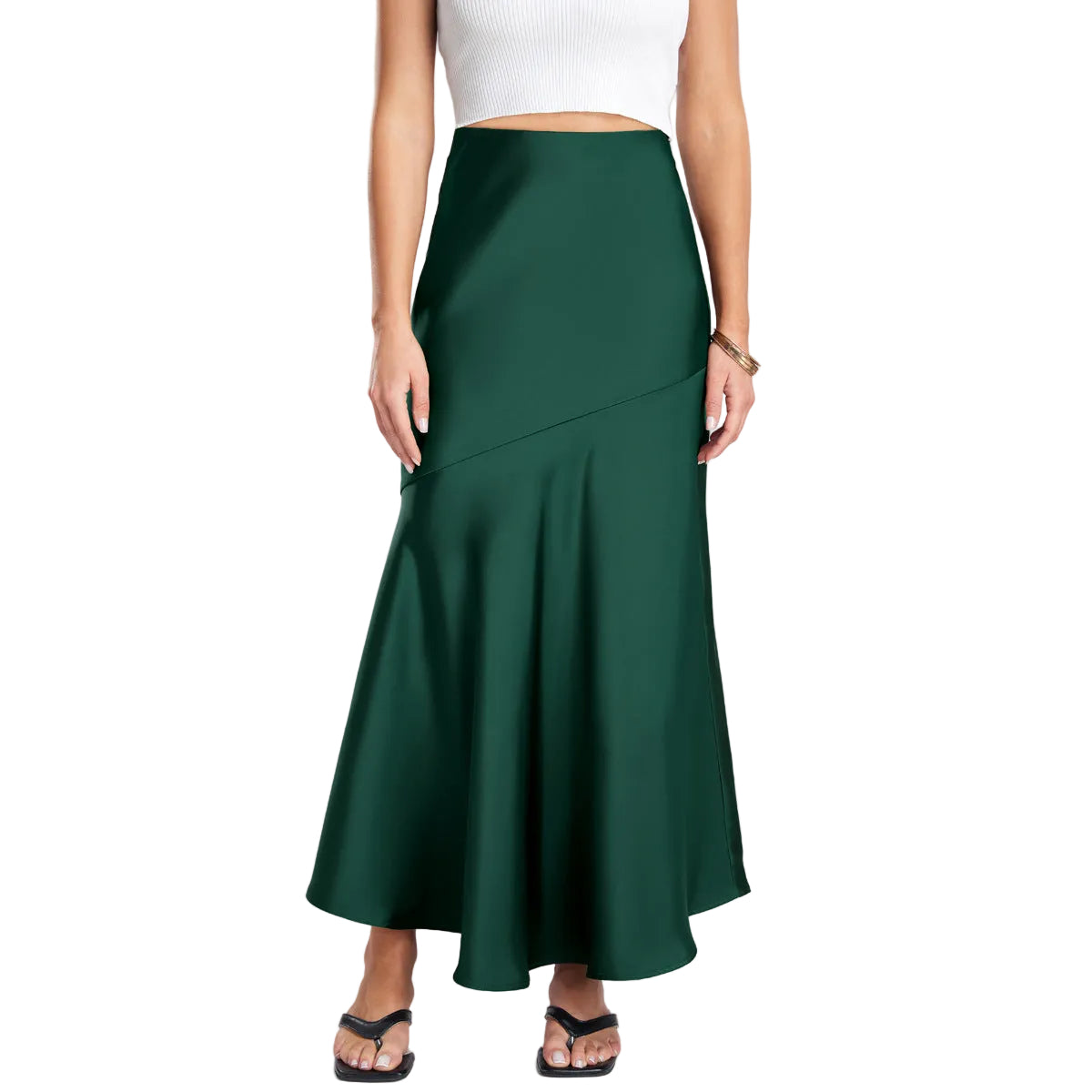 Green skirt worn by a person on a plain background