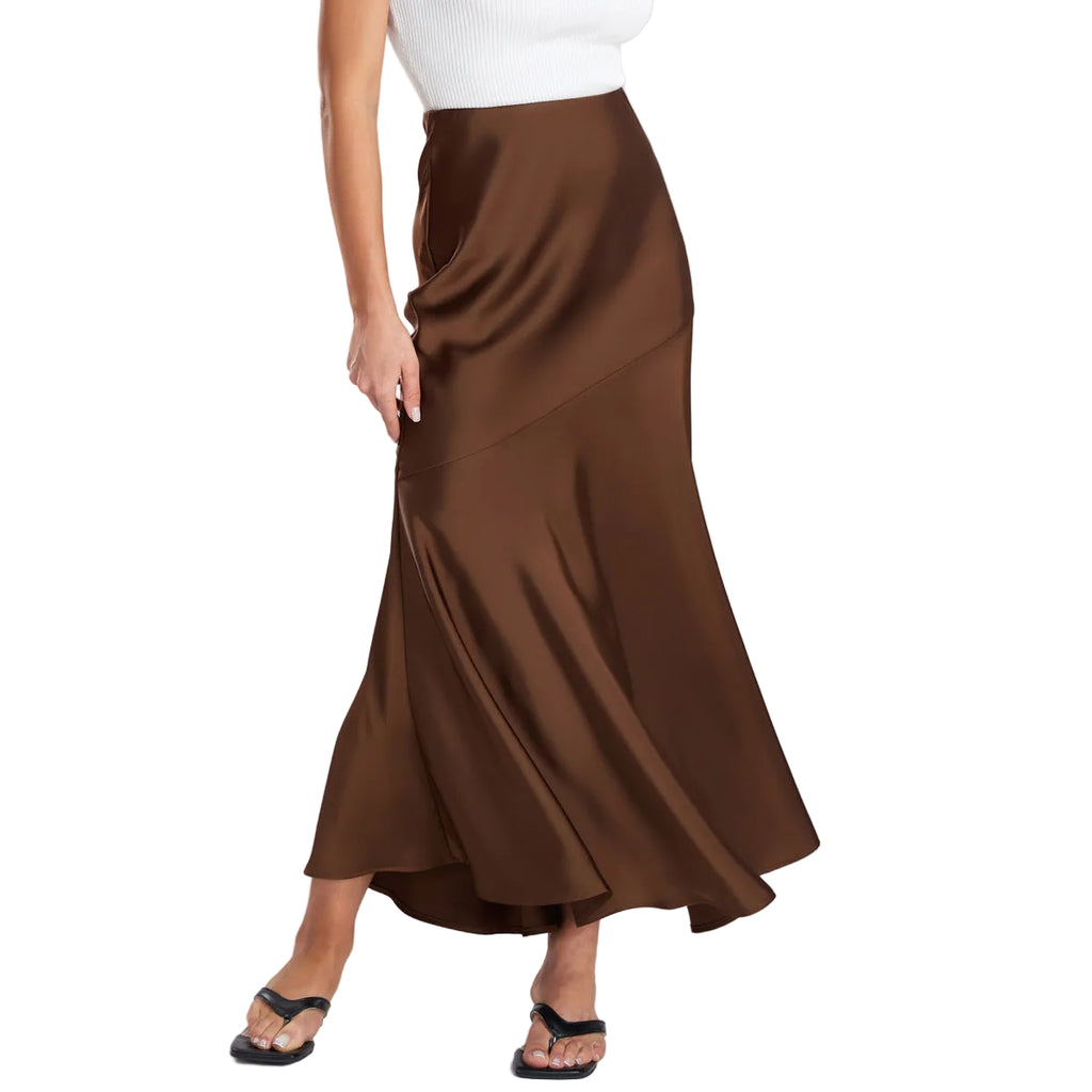 Brown skirt worn by a person on a white background