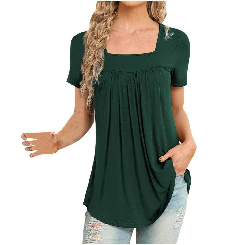 Green t-shirt worn by a person on a white background